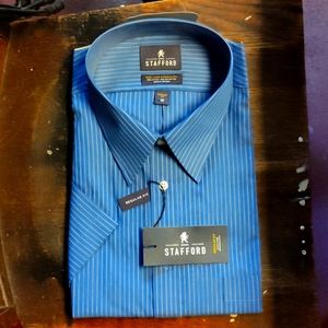 Man's Dress shirt, short sleeve,blue with white pin stripe, button up.